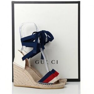 GUCCI
Canvas Sylvie Web Ankle Wrap
Espadrille Wedge Sandals